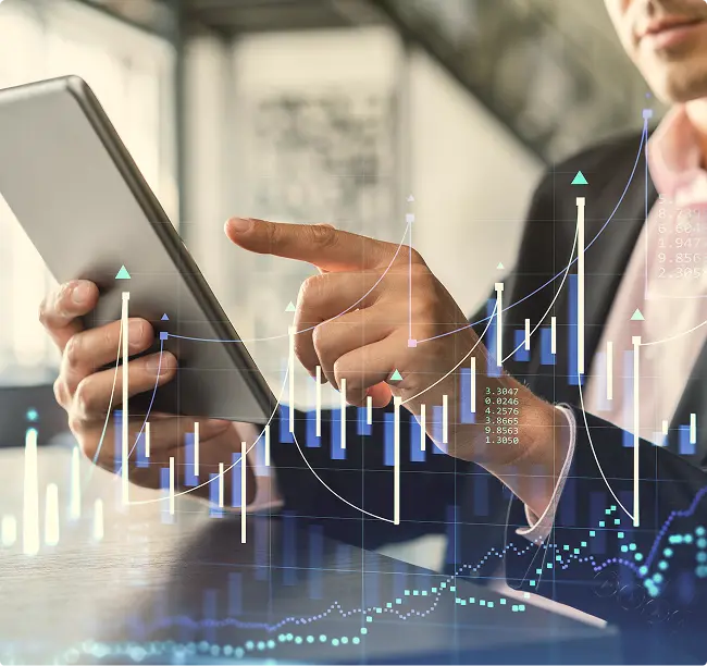 Profissional analisando gráficos financeiros